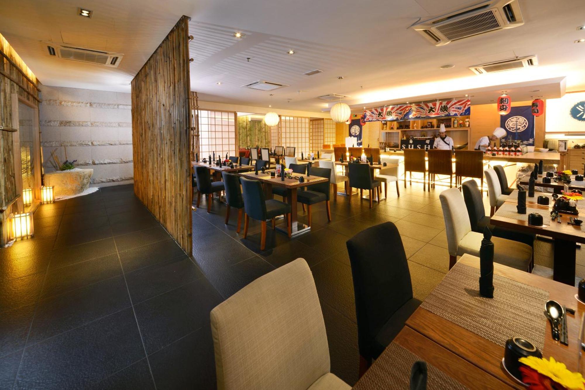 Grand Lexis Port Dickson Hotell Exteriör bild Interior of a restaurant in Singapore