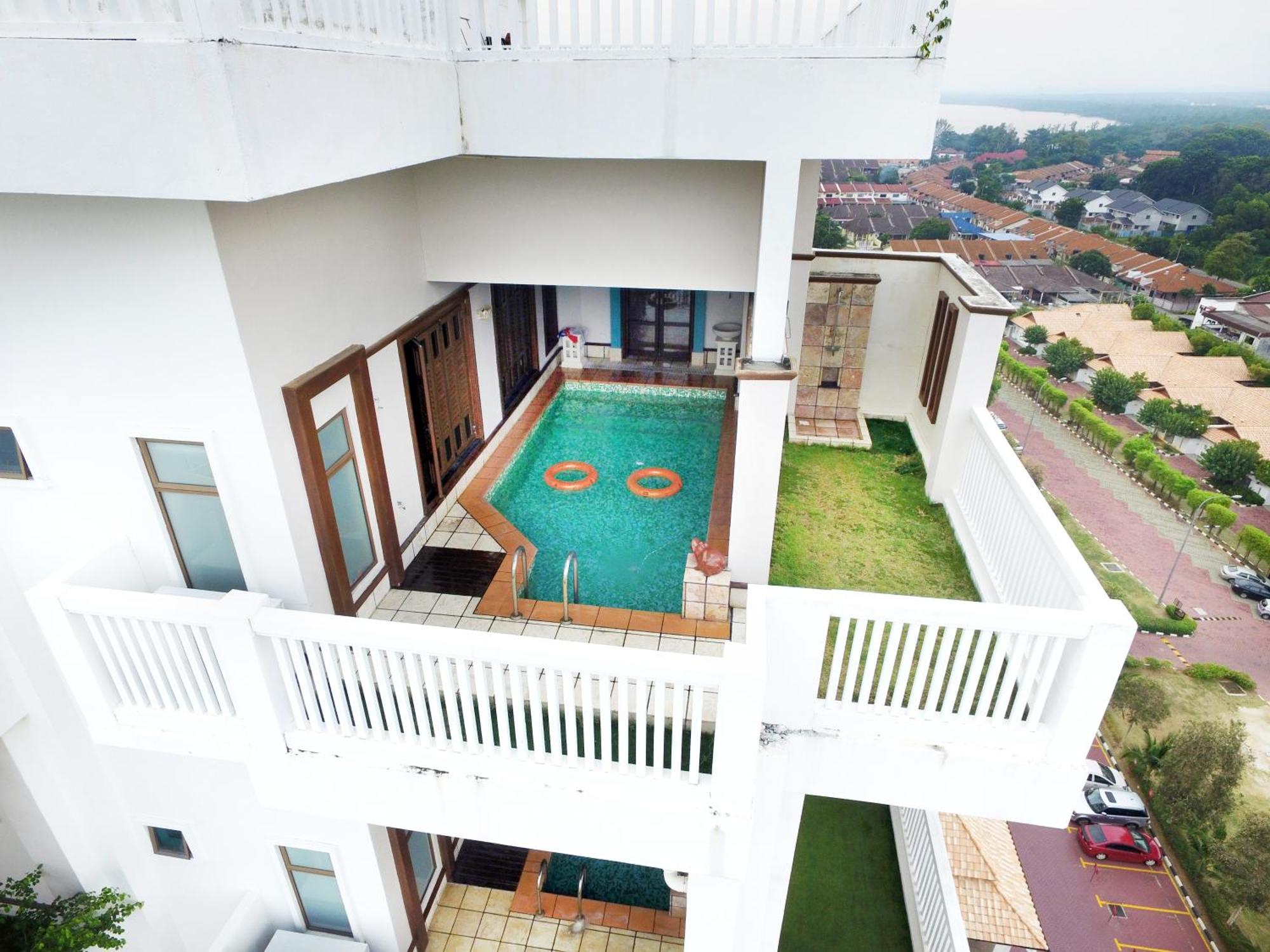 Grand Lexis Port Dickson Hotell Exteriör bild A private pool at a condominium in Malaysia